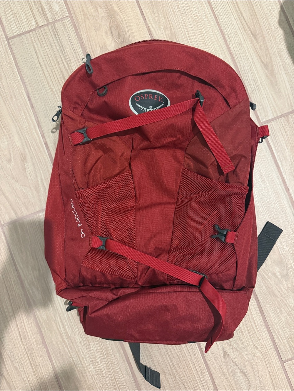 OSPREY Fairpoint 40 Red Backpack with Front Mesh Pockets, Laptop Sleeve